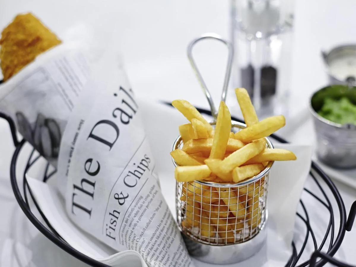 Plate of fries served at the hotel restaurant